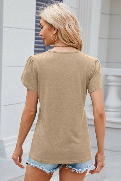 Chic V-Neck T-Shirt with Decorative ButtonsUpgrade Your Style with Our Chic V-Neck T-Shirt
 
 
Chic Design: Elevate your wardrobe with decorative buttons and a trendy V-neck.
 
Versatile: Whether for a casualLove Salve Decorative Buttonsjust arrived