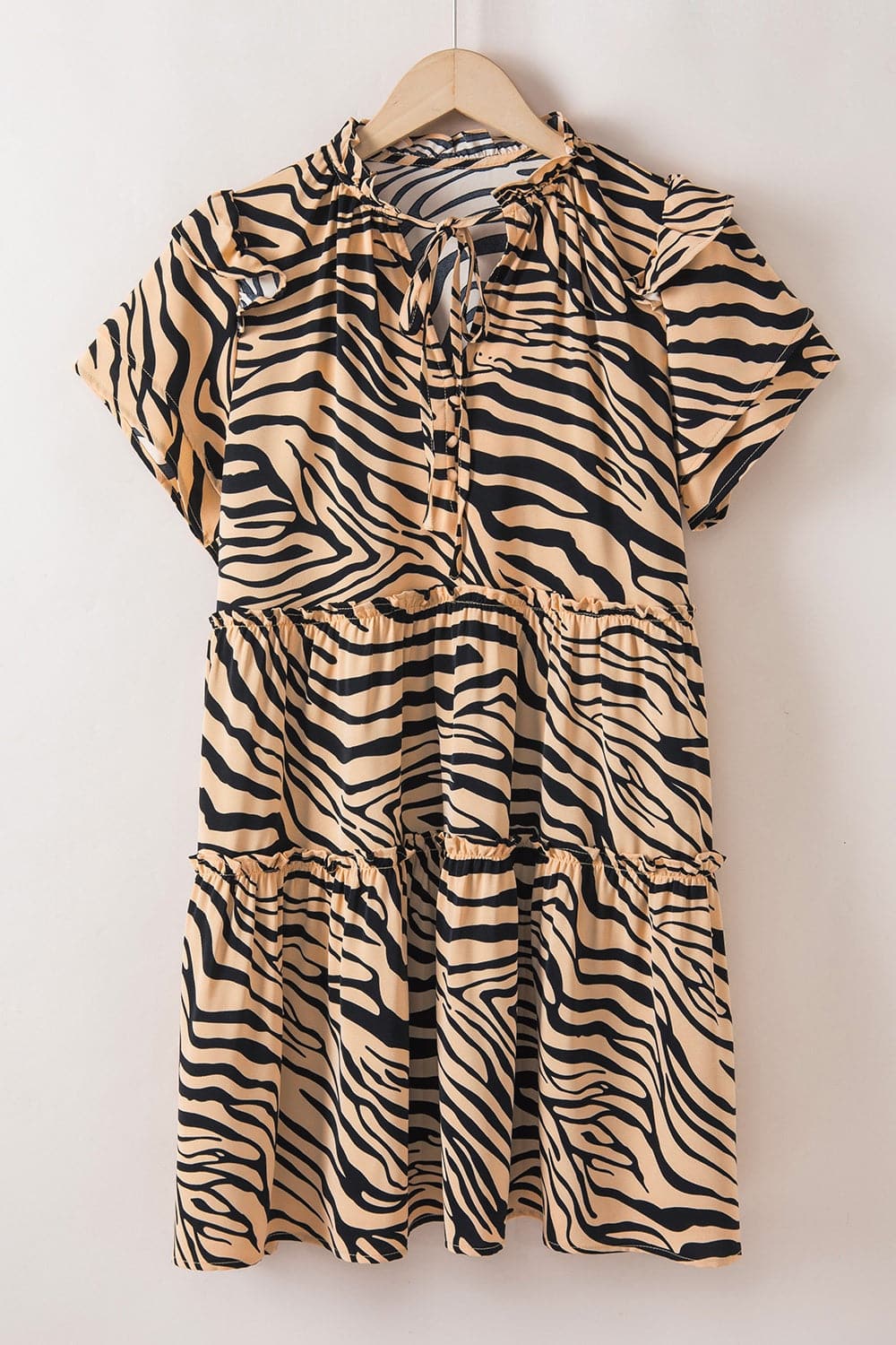 Ruffled Animal Print Tie Neck Mini Dress.