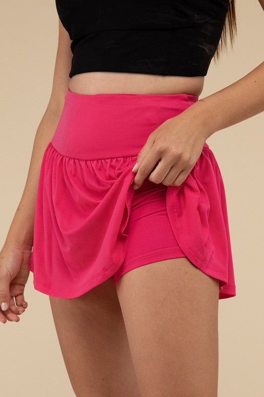 Wide band tennis skirt with pocket