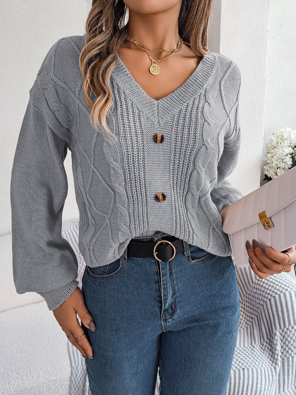 Cable-Knit Buttoned V-Neck Sweater.