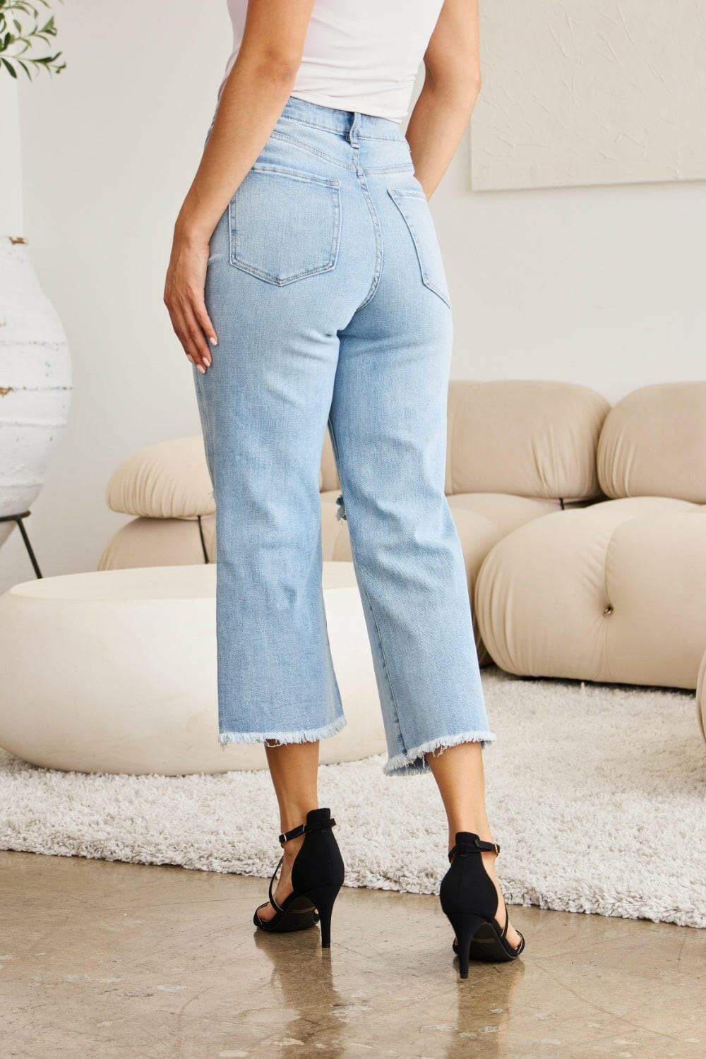 RFM Full Size Tummy Control High Waist Raw Hem Distressed Jeans.