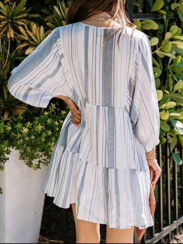 Tassel accent striped batwing sleeve dress with tie neck