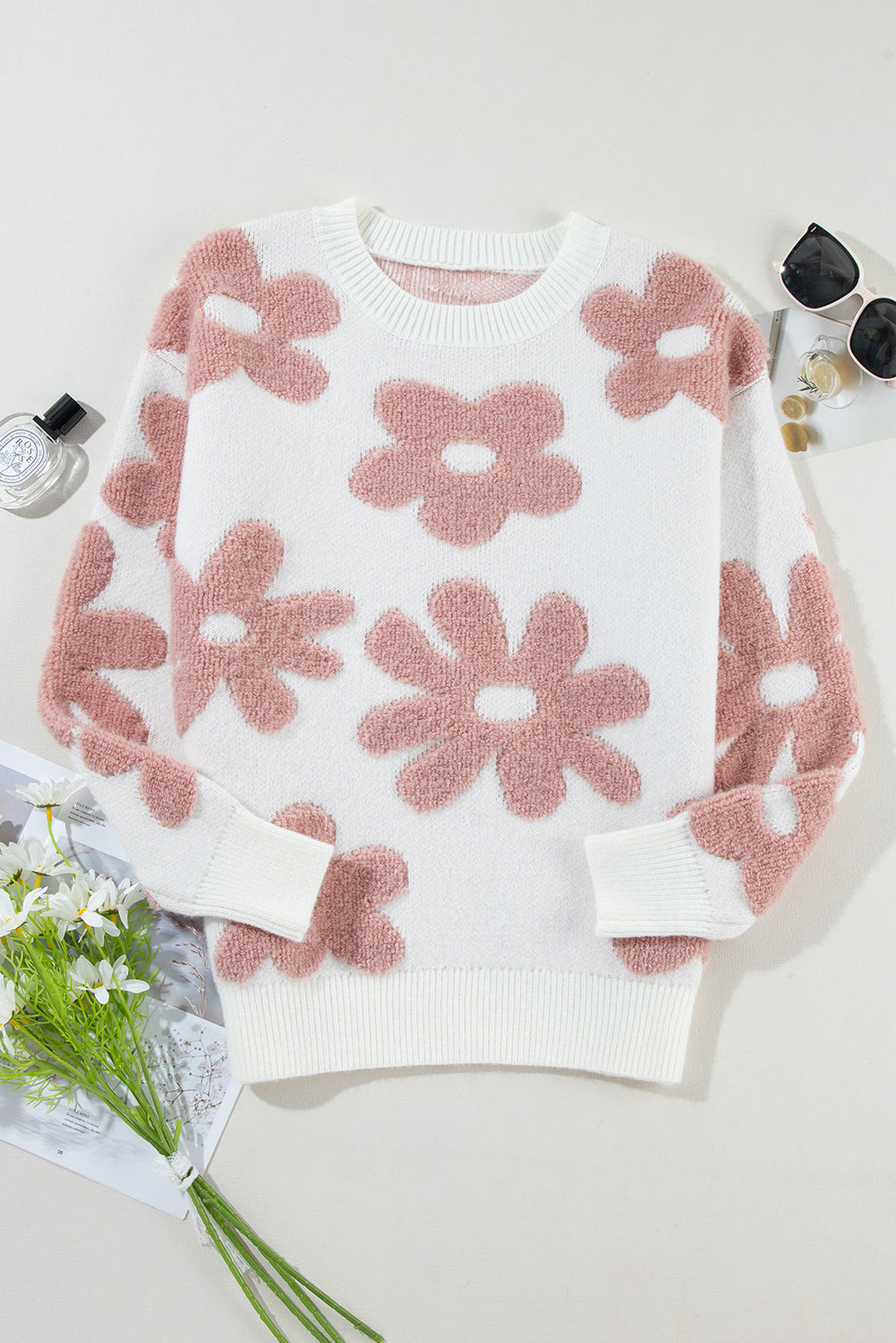 Floral-inspired white drop shoulder sweater for relaxed winter vibes