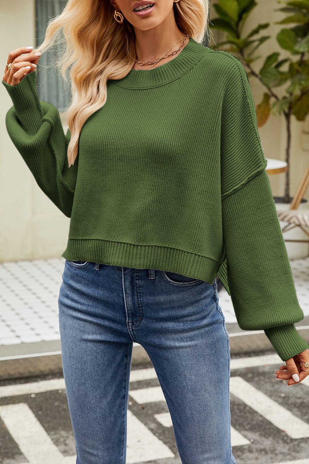 Round Neck Dropped Shoulder Sweater.