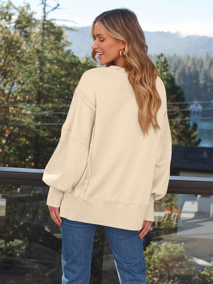 Slit Round Neck Long Sleeve Sweatshirt.