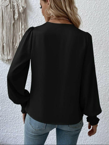 Surplice Smocked Lantern Sleeve Blouse.