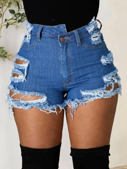 Trendy distressed denim shorts with raw hem and functional pockets.