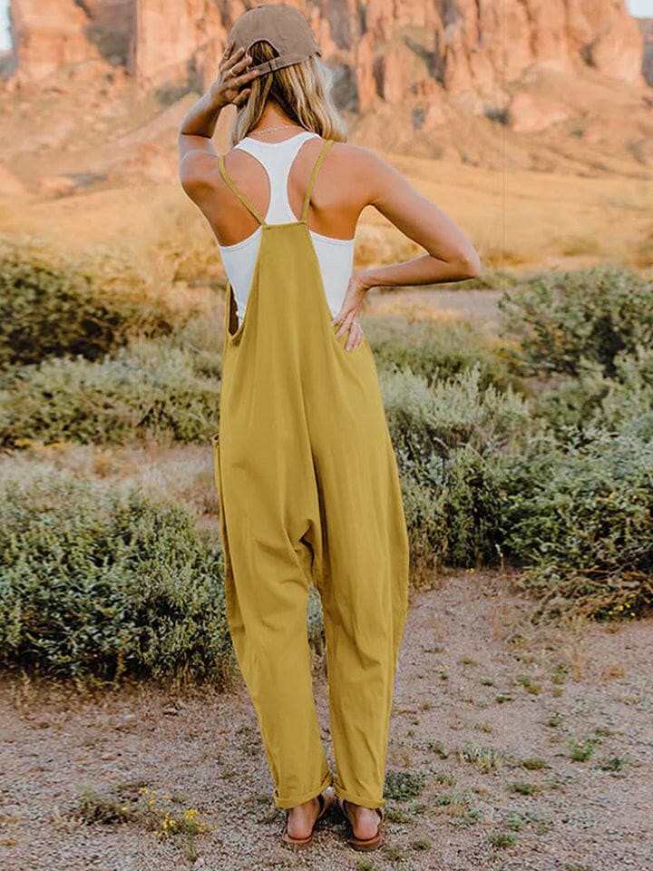 Elegant V-Neck Jumpsuit with Pockets - Luxe Blend of ComfortExperience Effortless Style and Comfort
 Step out in confidence with our Elegant V-Neck Jumpsuit with Pockets, a perfect blend of sophistication and functionality thLove Salve Pockets - Luxe Blendusa