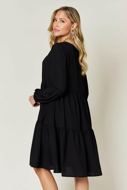 Double Vision V-Neck Balloon Sleeve Tiered DressDouble Vision V-Neck Balloon Sleeve Tiered Dress
 Step into the spotlight with our Double Vision V-Neck Balloon Sleeve Tiered Dress, a masterpiece designed to turn hLove Salve -Neck Balloon Sleeve Tiered DressColor