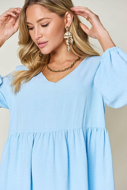 Double Vision V-Neck Balloon Sleeve Tiered DressDouble Vision V-Neck Balloon Sleeve Tiered Dress
 Step into the spotlight with our Double Vision V-Neck Balloon Sleeve Tiered Dress, a masterpiece designed to turn hLove Salve -Neck Balloon Sleeve Tiered DressColor