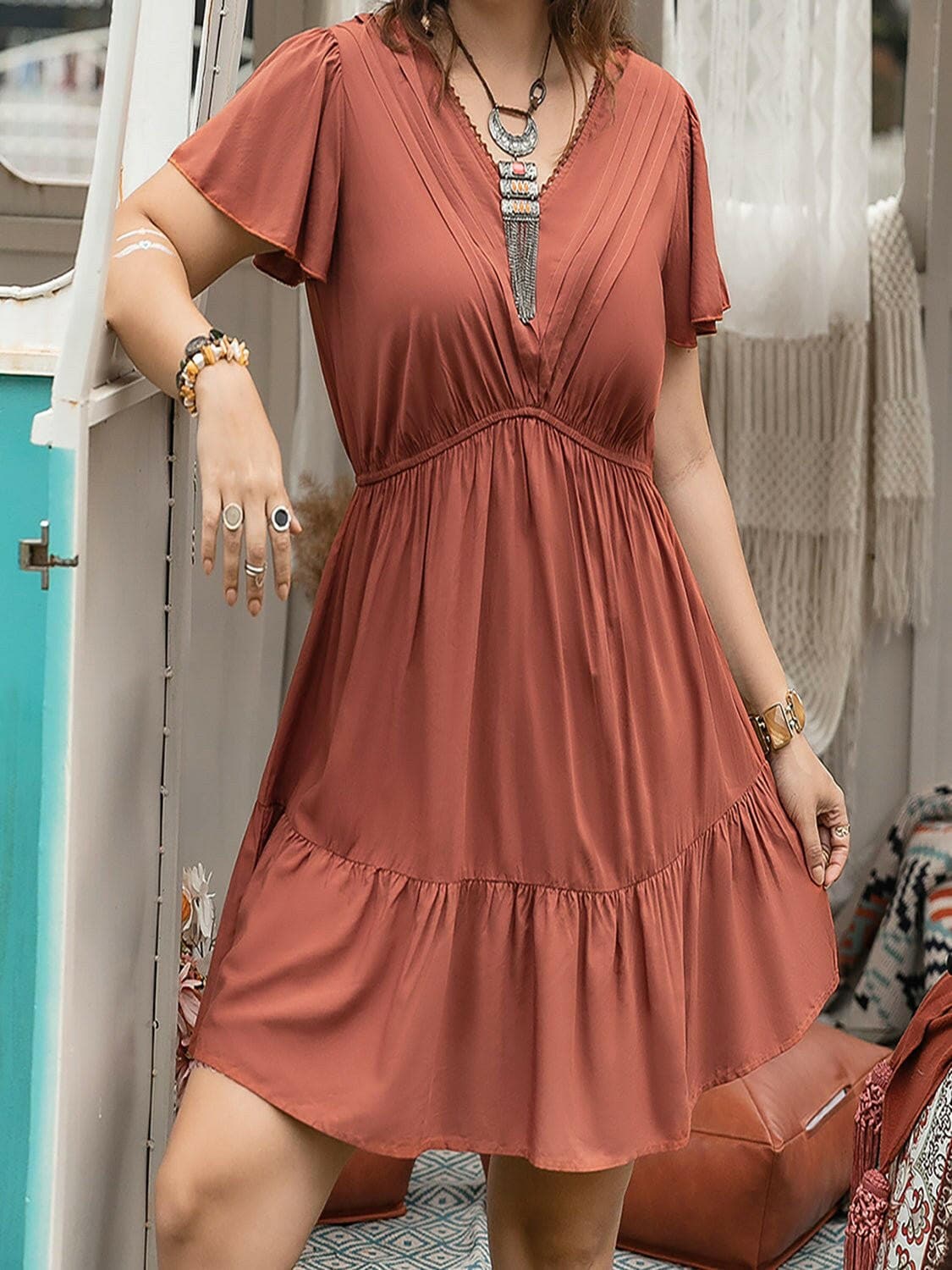 Ruffled V-Neck Plus Size Dress with Flirty HemFlaunt Your Style with Confidence
 Upgrade your wardrobe with our Ruffled V-Neck Plus Size Dress with Flirty Hem, a perfect blend of elegance and playfulness.
 
 MaiLove Salve Size Dressplus