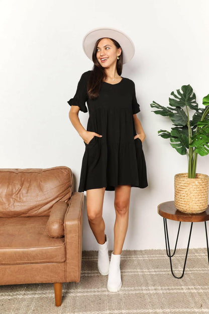 Flounce Sleeve V-Neck Tiered DressElevate Your Wardrobe with Our Flounce Sleeve V-Neck Tiered Dress
 Embrace a perfect blend of sophistication and playfulness with our Flounce Sleeve V-Neck Tiered DrLove Salve -Neck Tiered DressTIKTOK