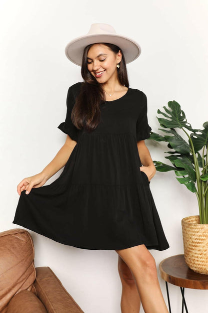 Flounce Sleeve V-Neck Tiered DressElevate Your Wardrobe with Our Flounce Sleeve V-Neck Tiered Dress
 Embrace a perfect blend of sophistication and playfulness with our Flounce Sleeve V-Neck Tiered DrLove Salve -Neck Tiered DressTIKTOK