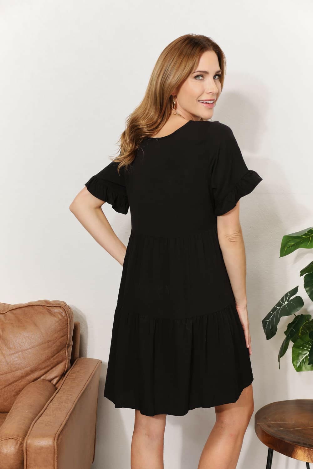 Flounce Sleeve V-Neck Tiered DressElevate Your Wardrobe with Our Flounce Sleeve V-Neck Tiered Dress
 Embrace a perfect blend of sophistication and playfulness with our Flounce Sleeve V-Neck Tiered DrLove Salve -Neck Tiered DressTIKTOK