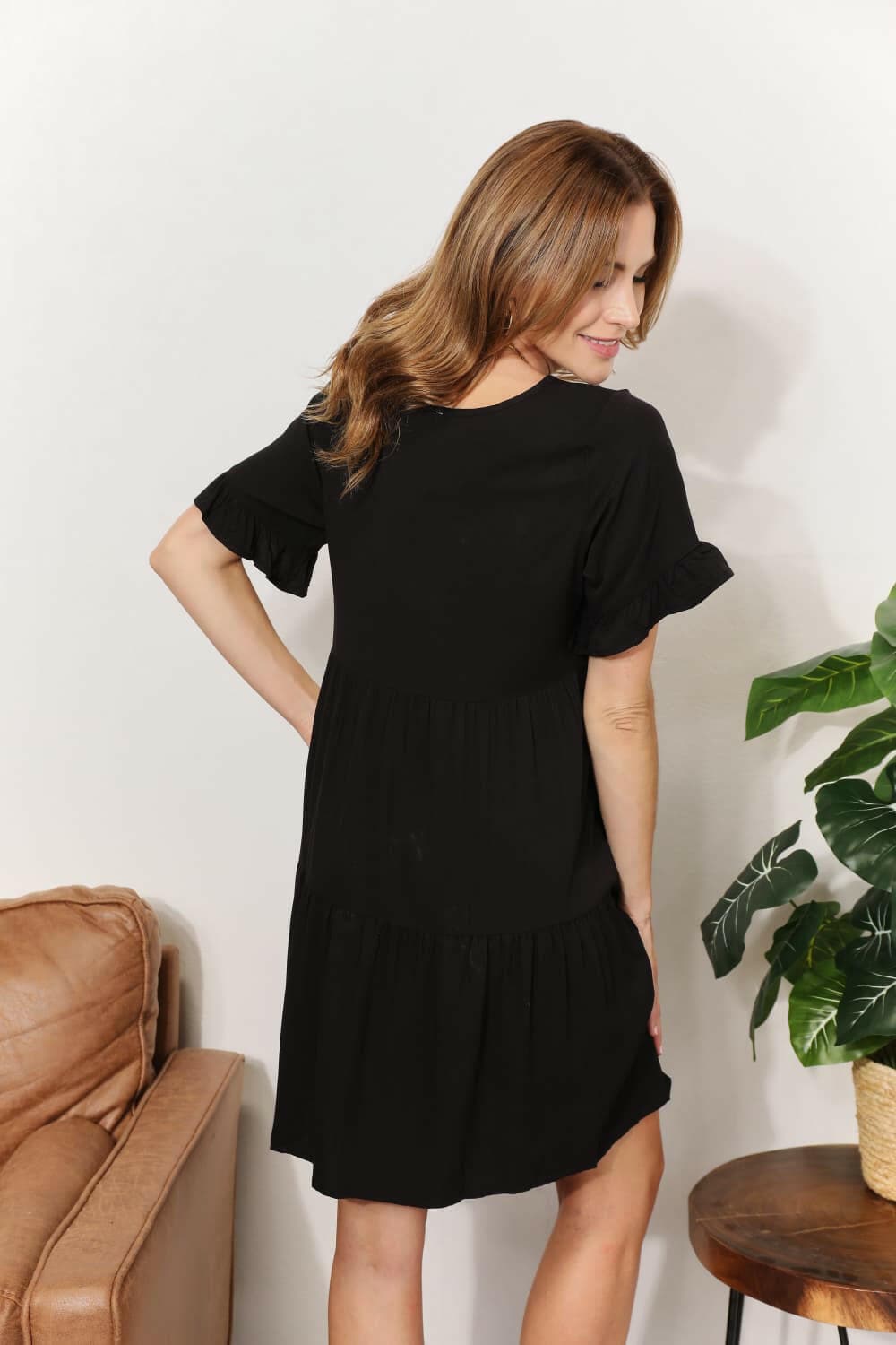 Flounce Sleeve V-Neck Tiered DressElevate Your Wardrobe with Our Flounce Sleeve V-Neck Tiered Dress
 Embrace a perfect blend of sophistication and playfulness with our Flounce Sleeve V-Neck Tiered DrLove Salve -Neck Tiered DressTIKTOK