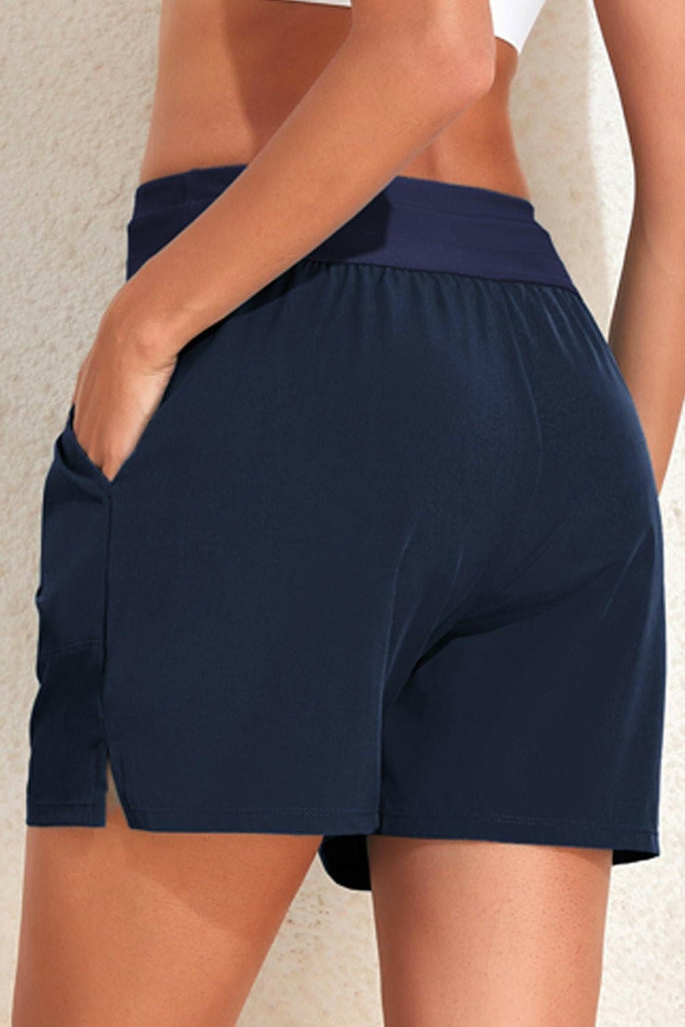 Beach-Ready Swim Shorts with Handy PocketsGet Ready for the Beach with our Swim Shorts!
 
 
Elevated Style: Stand out on the beach with these sleek solid swim shorts featuring a drawstring waist.
 
Handy PocLove Salve Beach-Ready Swim Shortsswimwear