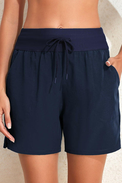 Beach-Ready Swim Shorts with Handy PocketsGet Ready for the Beach with our Swim Shorts!
 
 
Elevated Style: Stand out on the beach with these sleek solid swim shorts featuring a drawstring waist.
 
Handy PocLove Salve Beach-Ready Swim Shortsswimwear