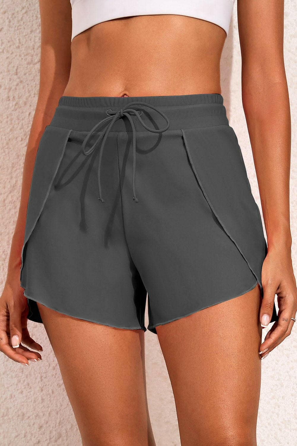 Beach Ready: Adjustable Waist Swim ShortsGet Beach Ready with Adjustable Waist Swim Shorts
 Upgrade your beach wardrobe with our versatile Beach Ready Adjustable Waist Swim Shorts. Made from a premium blendLove Salve Adjustable Waist Swim Shortsswimwear