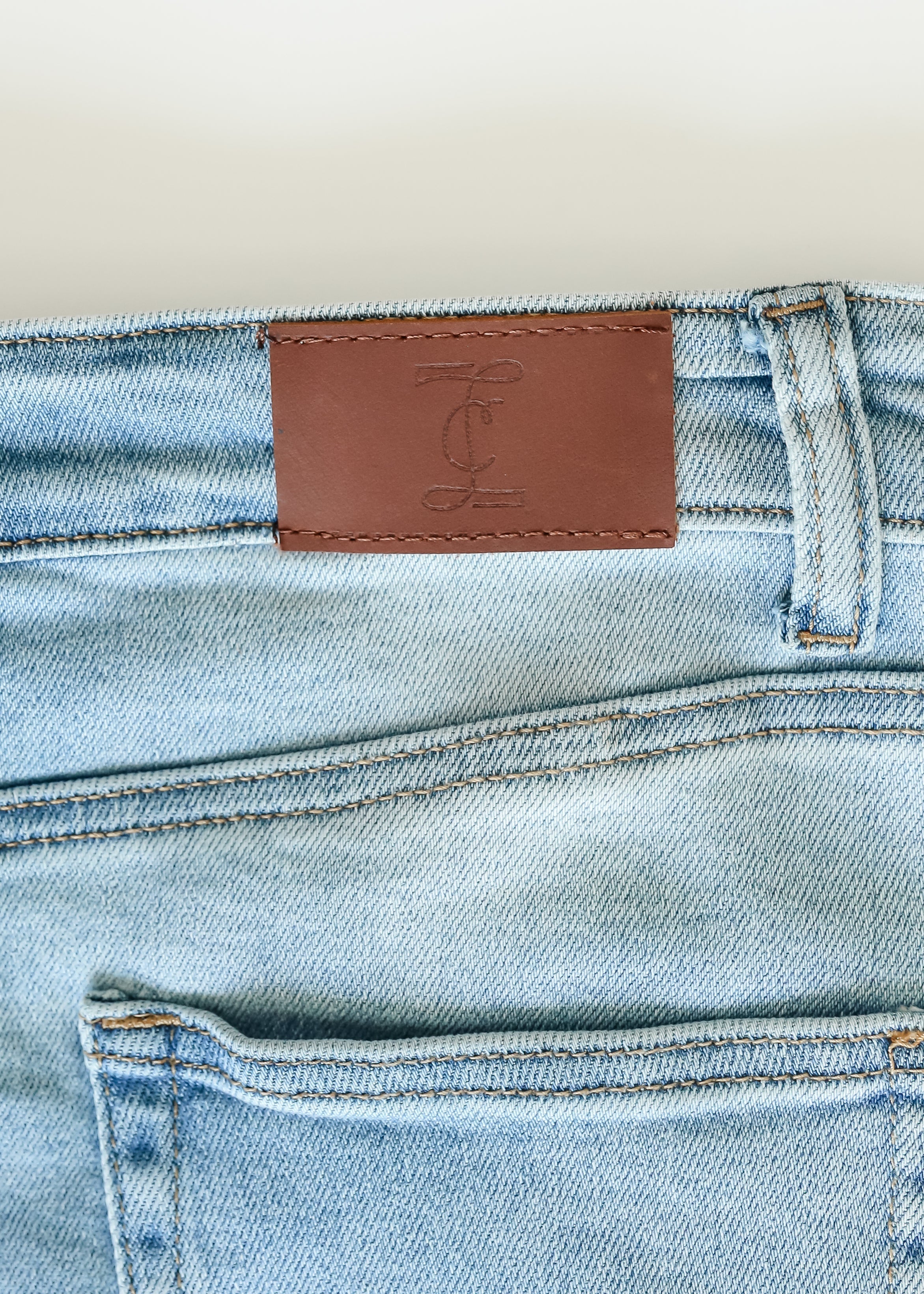 Drew Raw Hem Midi Denim Skirt Inherit Co.