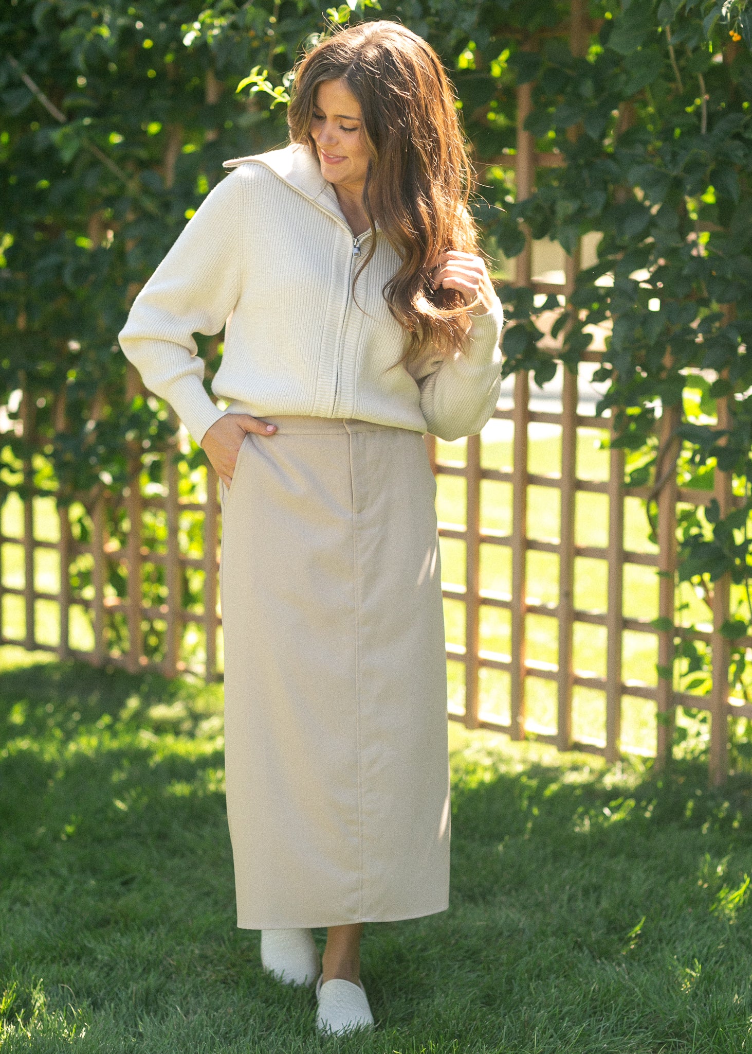 Close-up of the Inherit Co. brand label on the Dylan Midi Trouser Skirt, signifying authentic quality and thoughtful craftsma