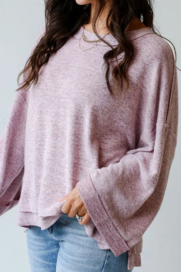 Chic high-low sheer long sleeve top with exposed seams