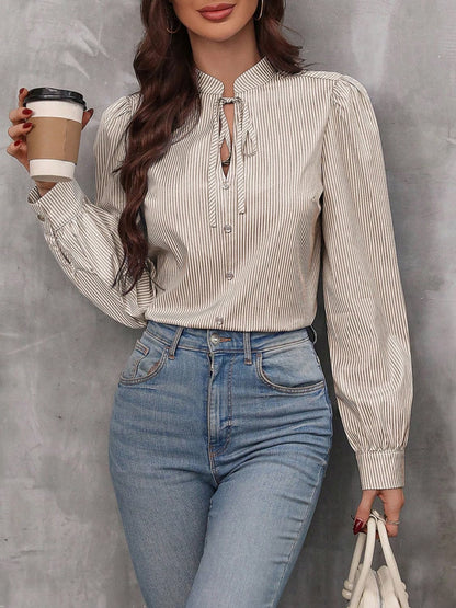 Chic tie-neck blouse with stripes