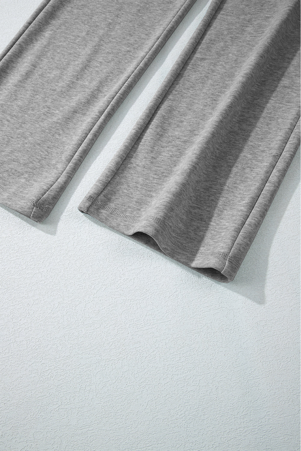 Cozy light grey fleece-lined casual pants with adjustable drawstring waist