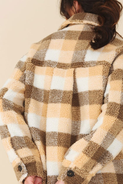 Cozy plaid sherpa jacket with functional pockets