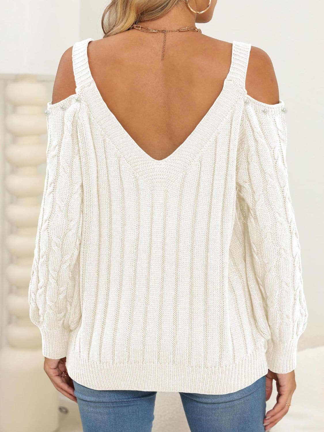 Chic cold shoulder cable-knit sweater