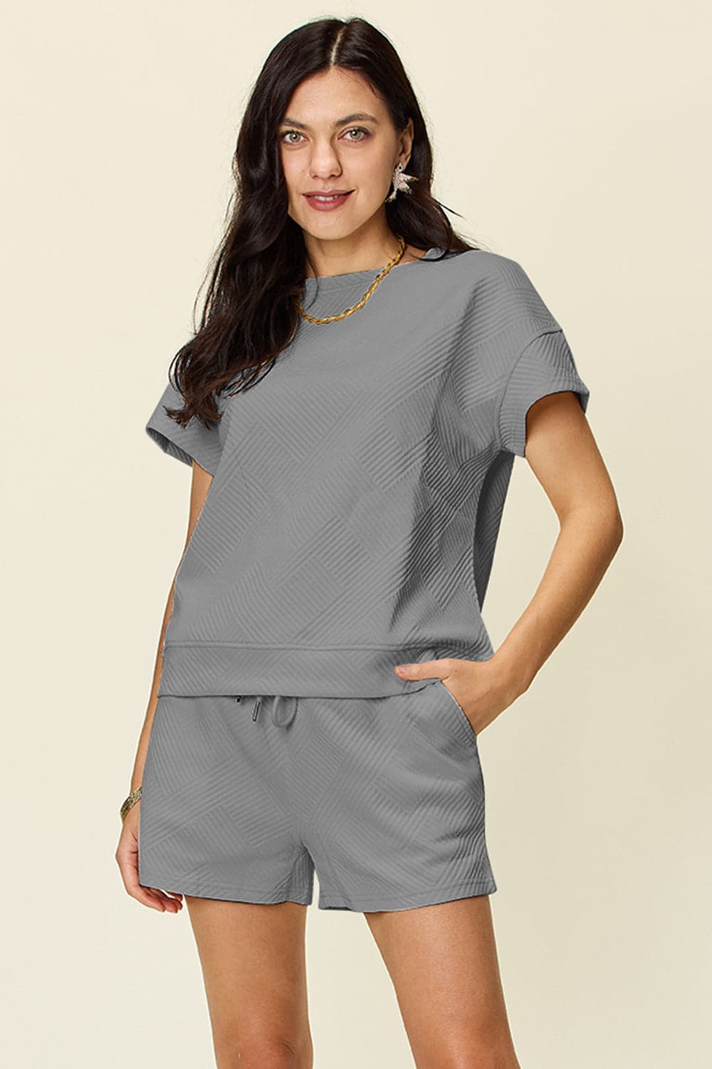 Double Take Full Size Texture Short Sleeve T-Shirt and Drawstring ShorFeatures: Drawstring
Number of pieces: Two-piece
Stretch: Slightly stretchy
Material composition: 97% polyester, 3% spandex
Care instructions: Machine wash cold. TumLove Salve Full Size Texture Short SleeveTwo-Piece Sets