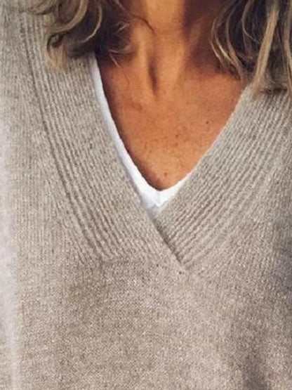 V-Neck Dropped Shoulder SweaterV-Neck Dropped Shoulder Sweater
 Upgrade your sweater collection with our V-Neck Dropped Shoulder Sweater, a perfect blend of style and comfort.
 Features:
 
 
BasicLove Salve -Neck Dropped Shoulder SweaterKnit Tops