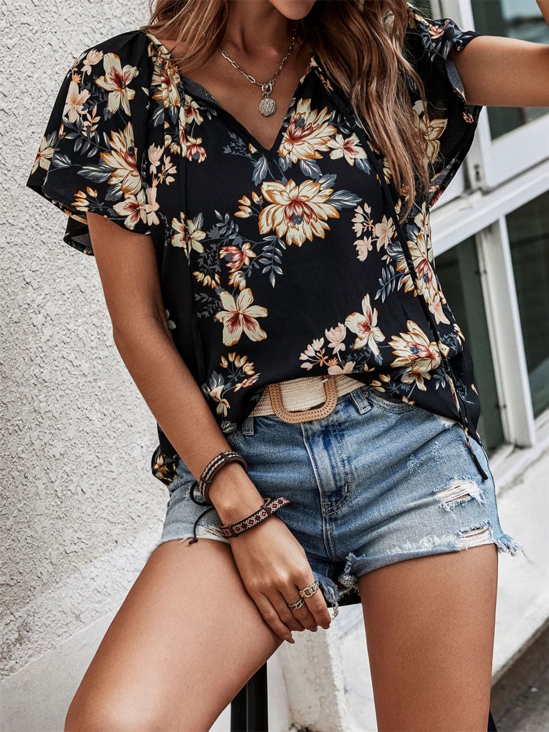 Printed Tie Neck Short Sleeve Blouse.