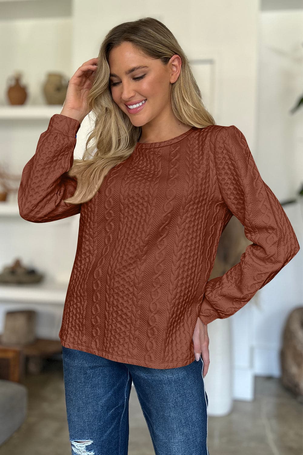 Textured Round Neck Long Sleeve Sweatshirt.