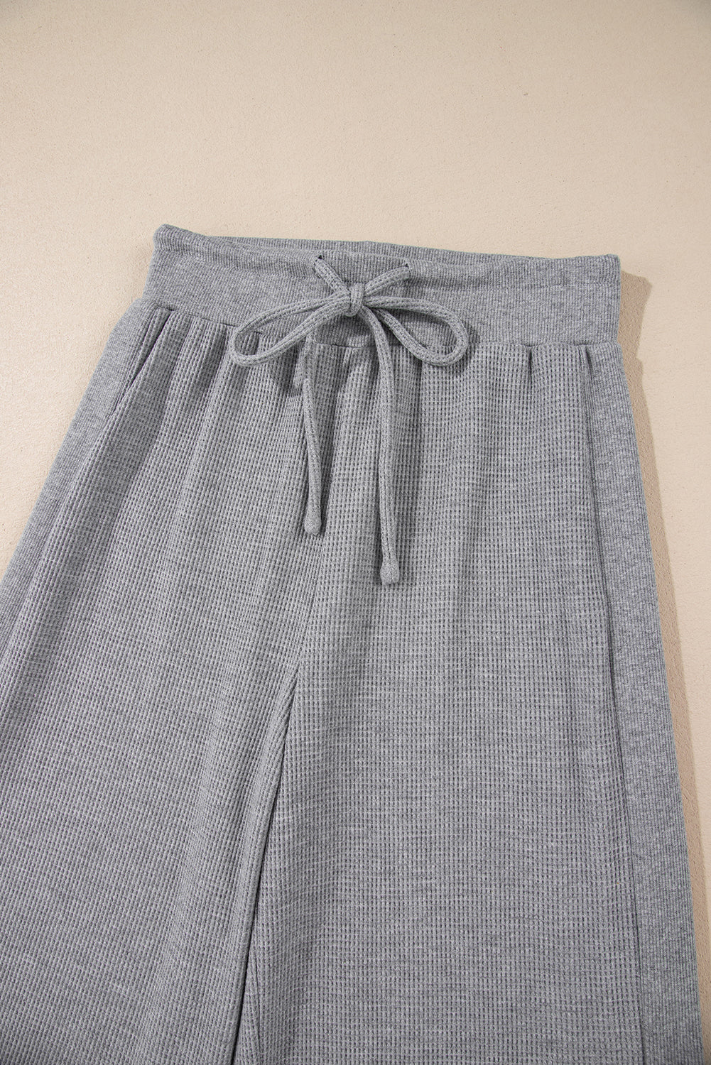 Cozy gray high-waist wide-leg pants with drawstring detail