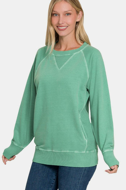 Zenana Pocketed Round Neck Long Sleeve Sweatshirt.