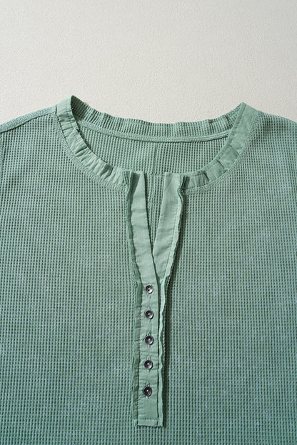 Trendy smoke green acid wash waffle knit long sleeve top with buttoned neckline