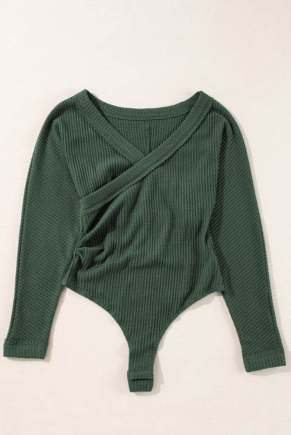 Chic blackish green ribbed knit wrap bodysuit with V-neck design