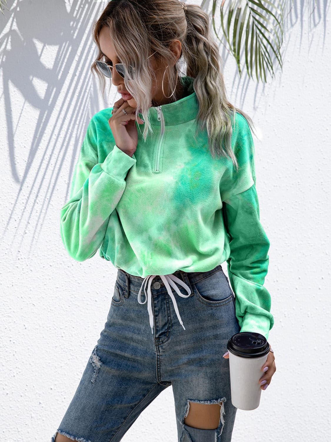 Tie-Dye Quarter Zip Dropped Shoulder Sweatshirt.