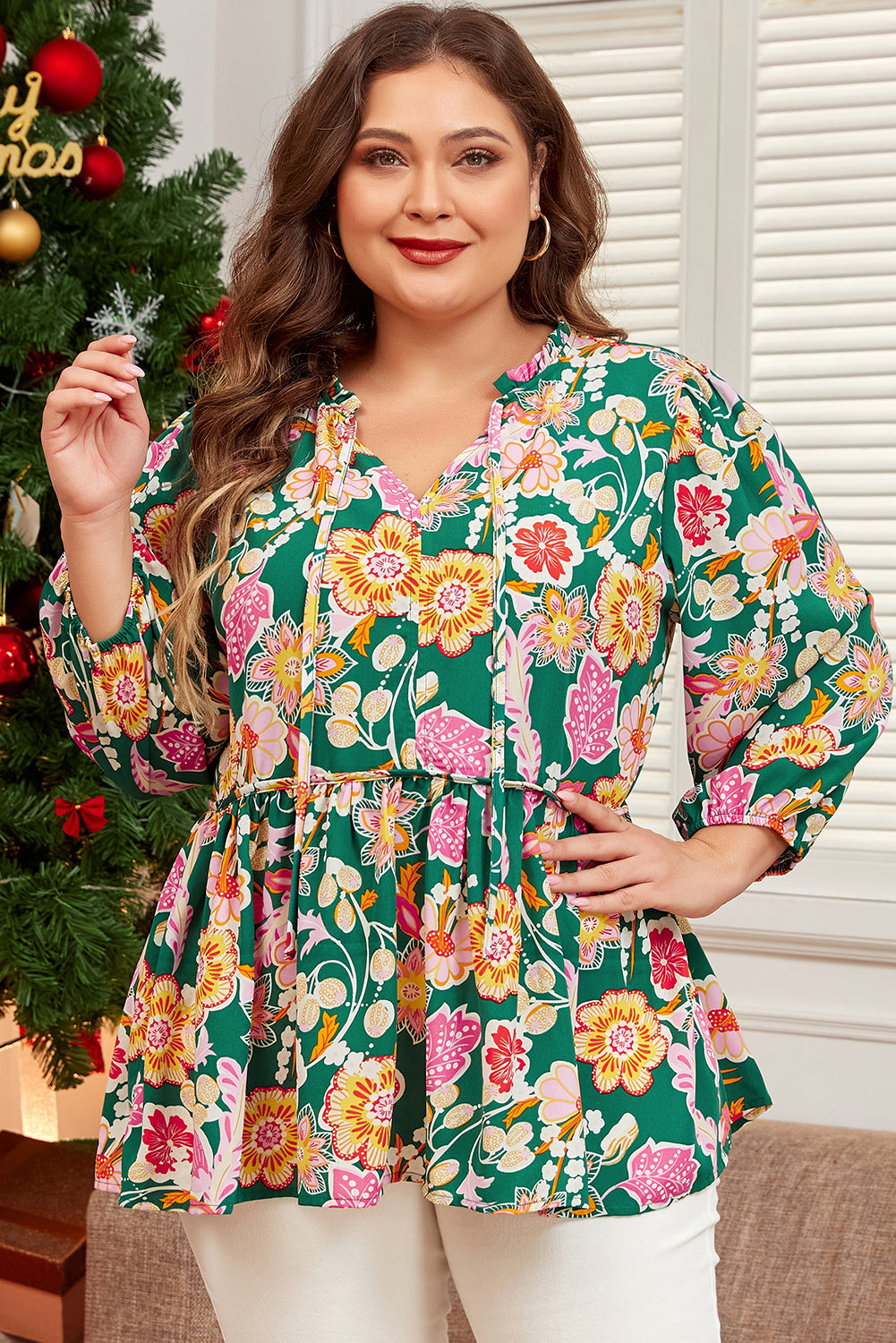 Floral elegance: Plus size green babydoll top with tied V-neck