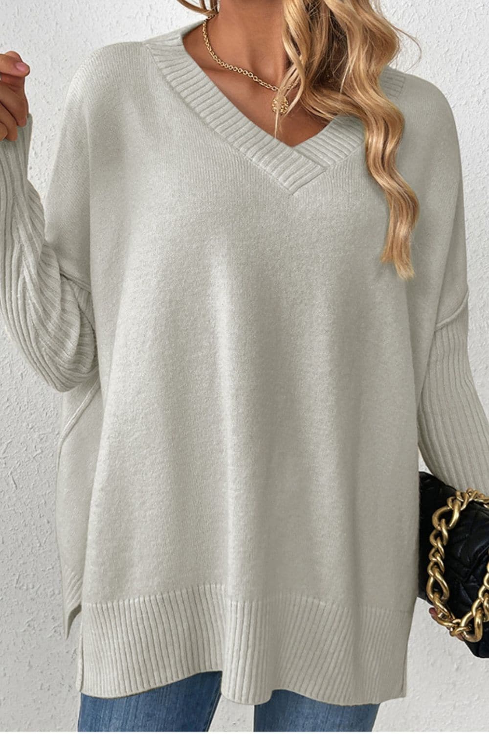 Slit V-Neck Dropped Shoulder Sweater.