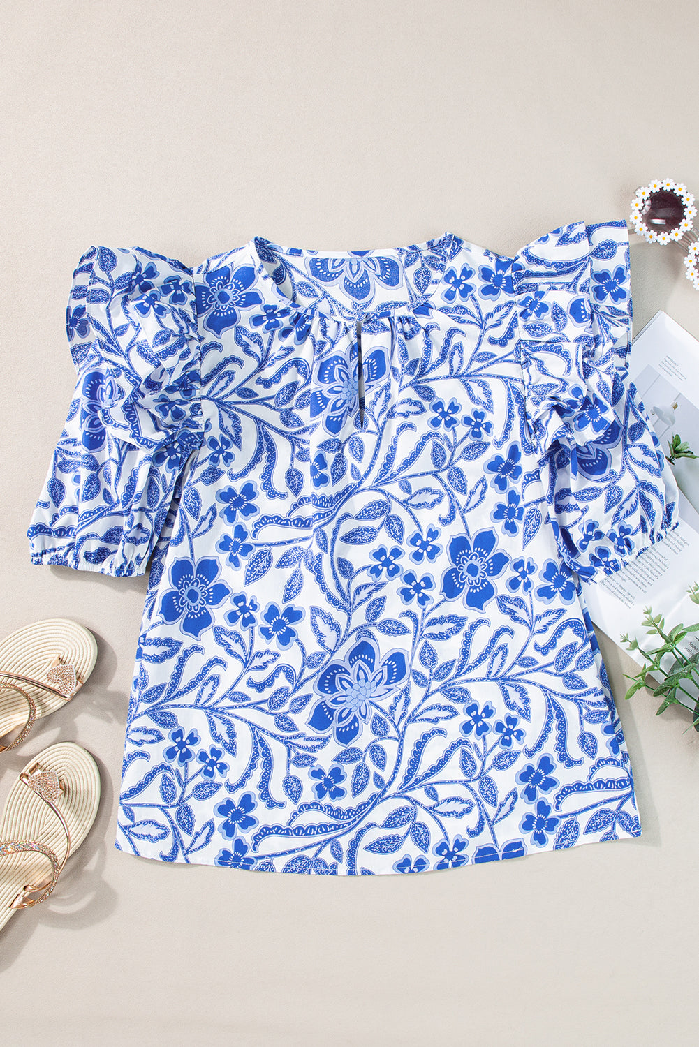 Elegant dark blue floral blouse