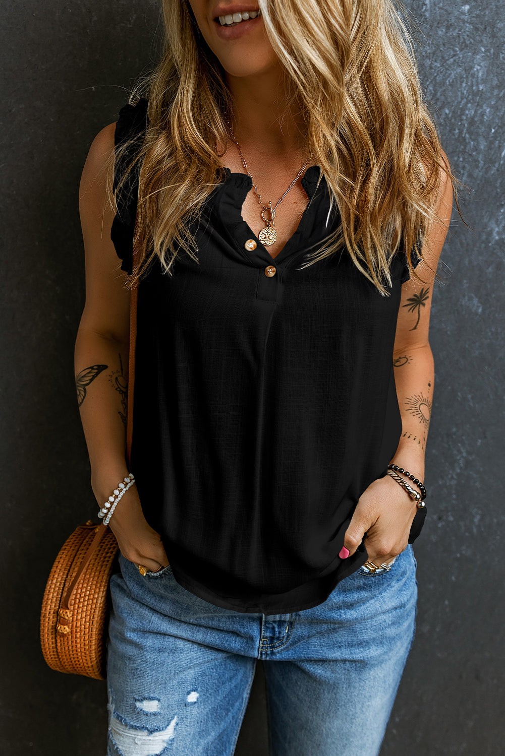 Chic black ruffled neck tank top with button detail