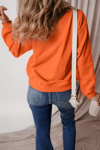 Cozy russet orange fleece-lined sweatshirt with drop shoulders