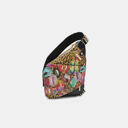 Fierce vegan leather leopard and lip pattern crossbody bag