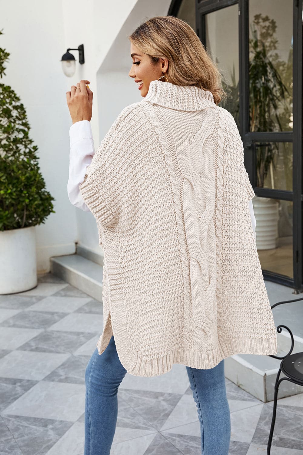 Cable-Knit Turtleneck Slit Sweater.