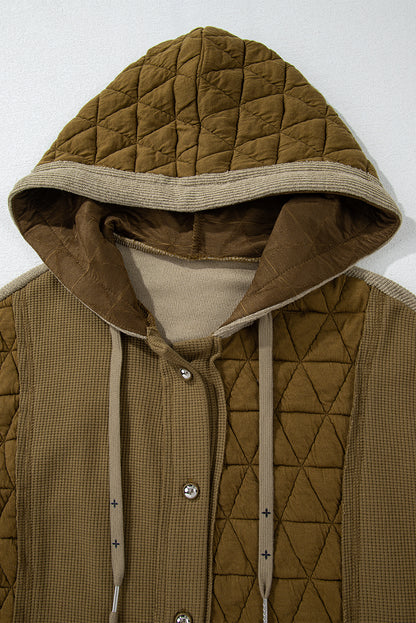 Cozy jungle green quilted hooded jacket with a stylish patchwork design