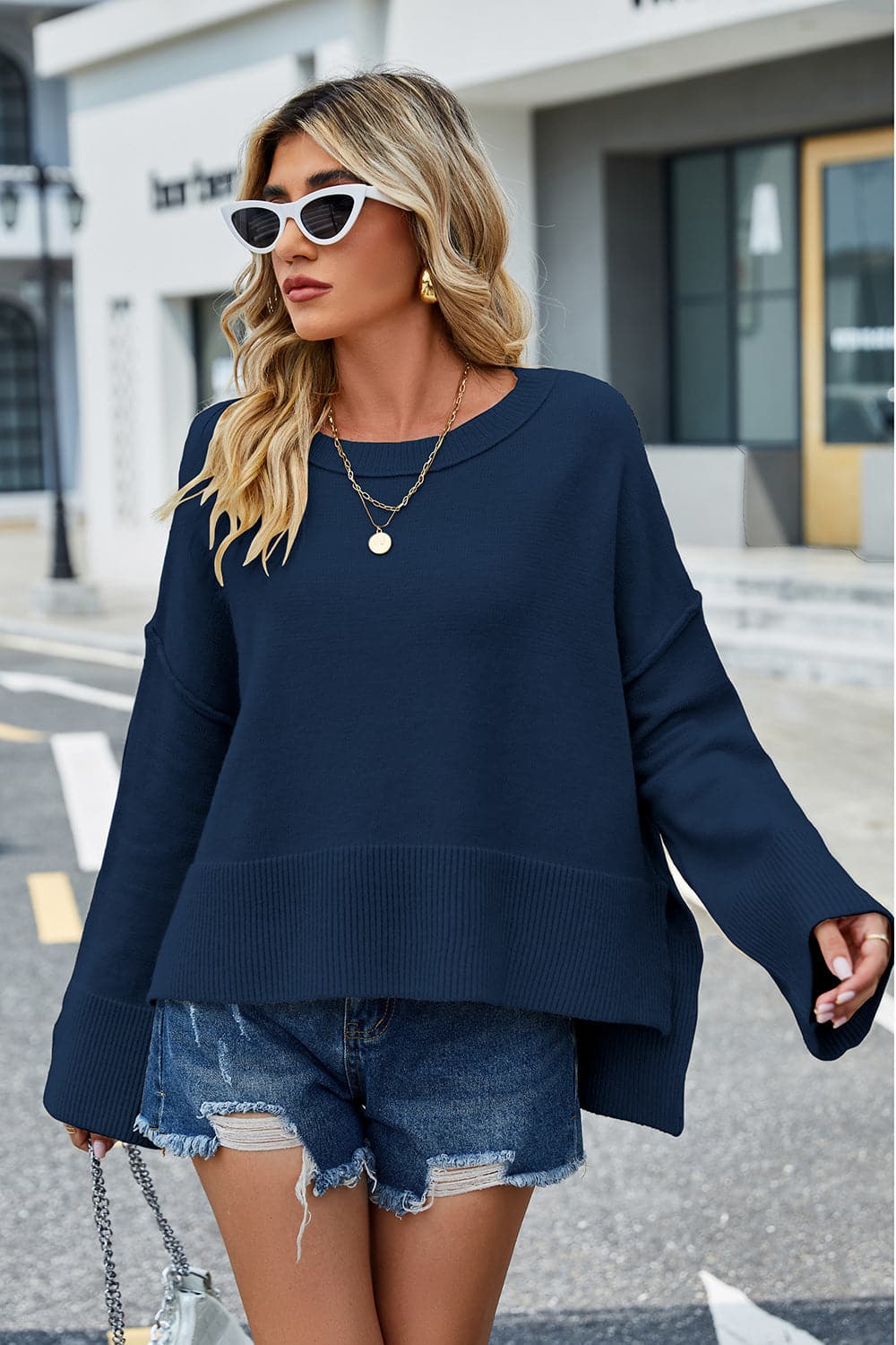 High-Low Slit Round Neck Long Sleeve Sweater.