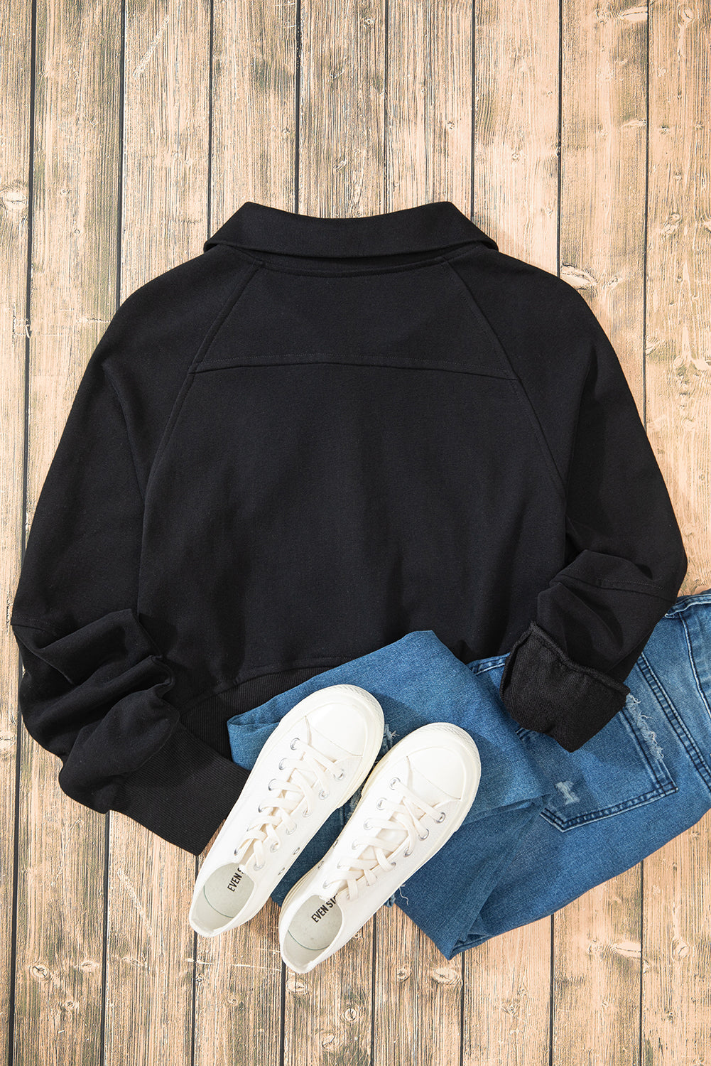 Chic black quarter zip sweatshirt with kangaroo pocket