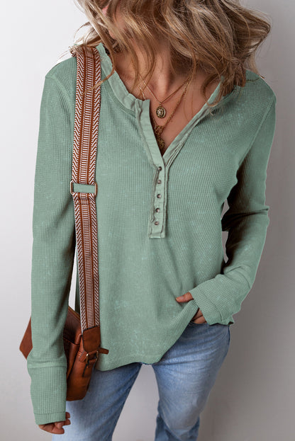 Trendy smoke green acid wash waffle knit long sleeve top with buttoned neckline