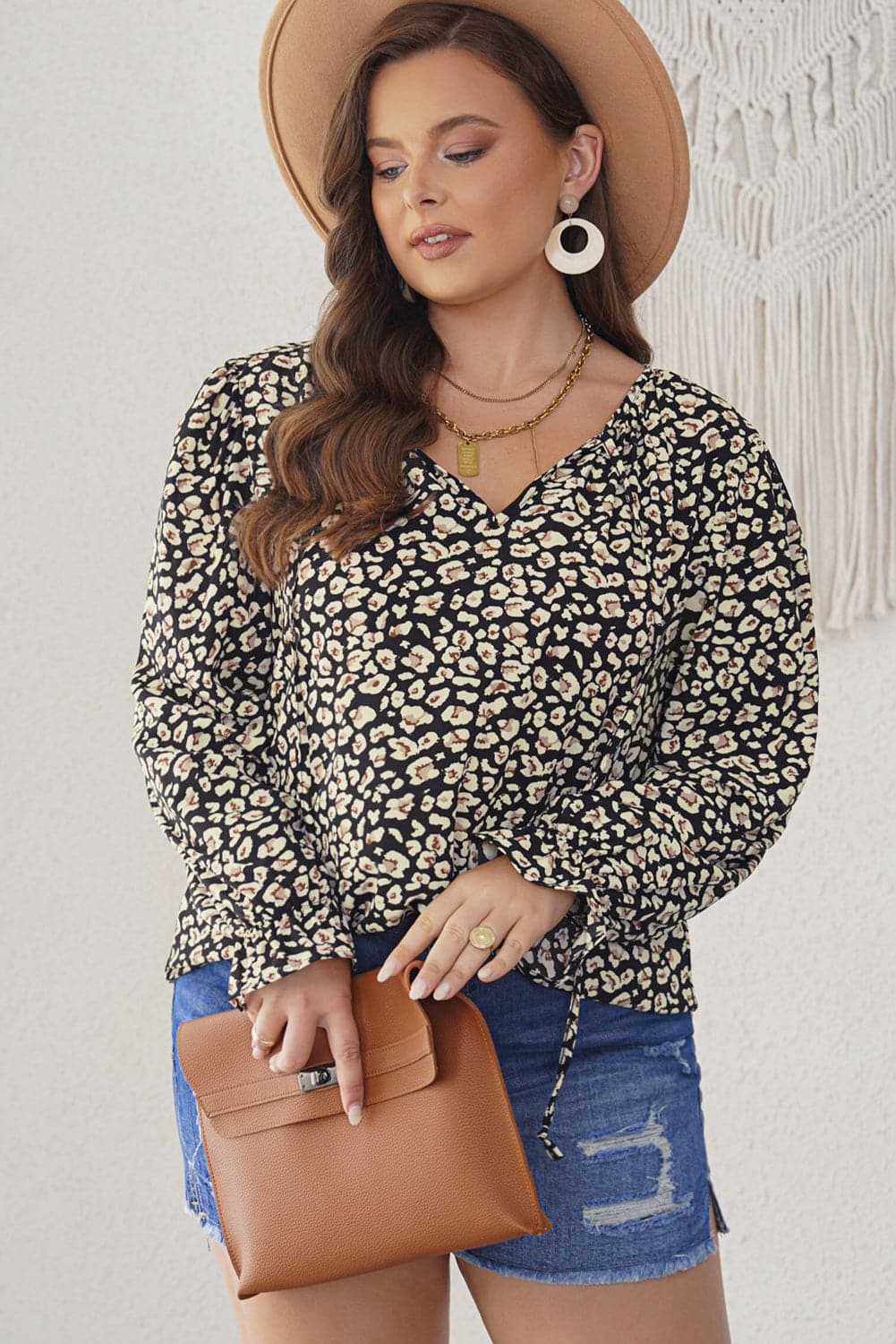 Plus Size Floral Flounce Sleeve Tie-Neck Blouse.